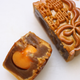 A lotus paste mooncake with double egg yolks.